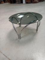 Une TABLE basse en verre fumé et chrome.Vers 1970. H...