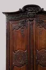 ARMOIRE en chêne, ouvrant à deux portes à faux dormant,...