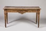 TABLE-CONSOLE en noyer posant sur des pieds gaine moulurés, ceinture...