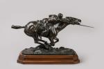 Edmond DRAPPIER (XIXème - XXème siècle). Cavalier chargeant. Bronze à...