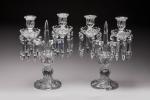 BACCARAT. Paire de CANDELABRES en cristal moulé et taillé, le...