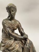 HOULET (XIXème- XXème siècle)  Jeune femme assise à la...