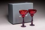 Daum et Salvador Dali (1904-1989)
Deux verres rouges sur pied à...