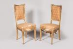 Louis Majorelle (1859-1926)
Paire de chaises en bois doré mouluré et...