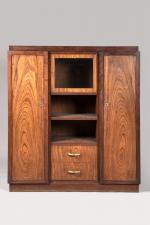 André Sornay (1902-2000)
Armoire en bois exotique et noyer teinté ouvrant...