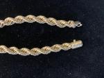 BRACELET en or jaune 750°/°° maille double torses. 
Poids :...