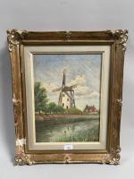 ECOLE HOLLANDAISE. 
Le moulin. 
Huile sur toile Signée en bas...