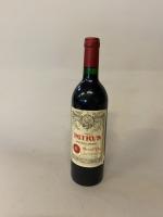 Une BOUTEILLE de PETRUS pomerol 1986.