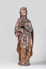 VIERGE à l'ENFANT en chêne sculpté, dos plat. Elle présente...