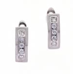 Paire de BOUCLES d'OREILLES en or gris 750 °/°° sertie...