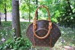 Louis VUITTON. Sac Ellipse en toile Monogram et cuir naturel,...